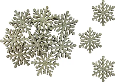 A collection of glittery snowflake-shaped decorations scattered on a white background.