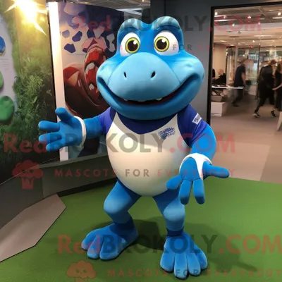Obrázek produktu pro Postava REDBROKOLY maskota modré žáby oblečená do rugbyové košile a zábalů