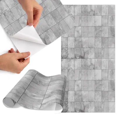 Produktbild von Möbelfolie 50x100 cm - Klebefolie Möbel - Selbstklebende Folie - Folie für Möbel - Möbelfolie Küche - Klebefolie Küche - Möbelfolie Schrank - Wasserdicht - Abwaschbar - Selbstklebend - Luftblasenfrei - Rückstandslos entfernbar - Graue Fliesen