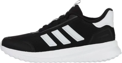 A side view of a black and white Adidas sneaker.