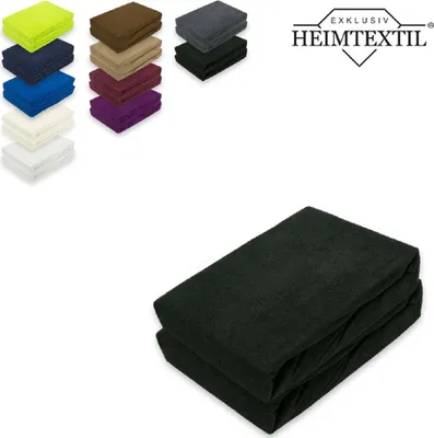 A stack of folded black fitted sheets is shown in the foreground, with a selection of other colored fitted sheets and a logo in the background.