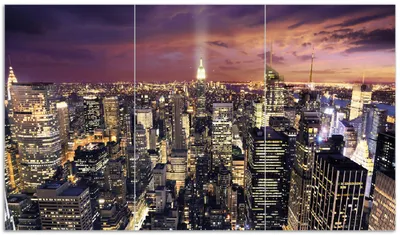 Produktbild von Wallario Herdabdeckplatte aus Glas, Größe 90 x 52 cm 3-teilig, Motiv New York bei Nacht - Panoramablick über die Stadt