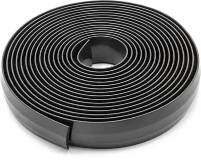 A coiled black magnetic strip on a white background.