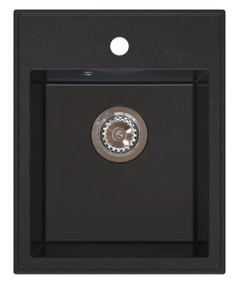 A top-down view of a black granite kitchen sink with a drain.
