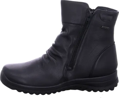 A studio shot of a black boot against a white background.