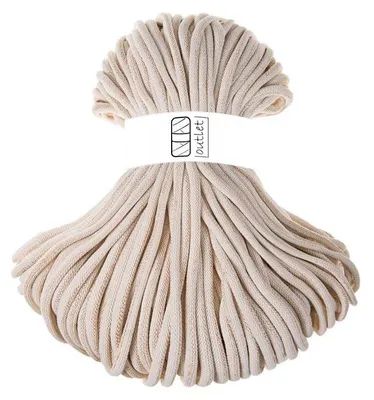 A bundle of beige cord is shown against a white background.