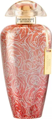 A close-up studio shot of a perfume bottle with a rose pattern.
