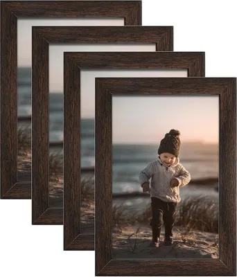 Immagine prodotto di Set di 4 cornici 10x15cm in legno e vetro marrone per decorazione da parete e tavolo