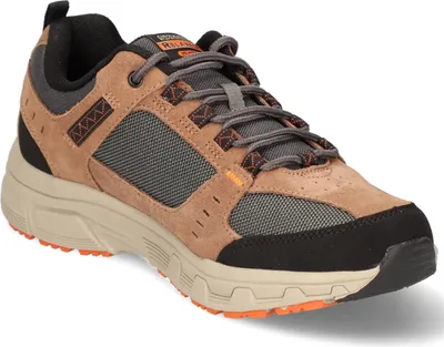 A single brown Skechers shoe is shown against a white background.