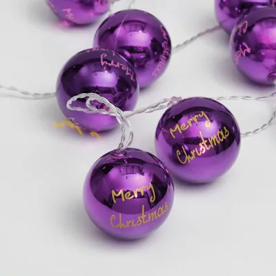 Produktbild von ACA Dekorative LED-Lichterkette mit 10 LEDs, batteriebetrieben (3xAA), warmweiß, violett, Kunststoff, Schutzart IP20, 135 + 30 cm langes, transparentes Stromkabel XPPBALL10WW2A