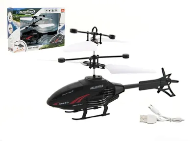 Produktbild von 16 cm großer Plastikhubschrauber, der auf Handbewegungen reagiert, mit USB-Ladekabel, in einer Verpackung von 22 x 15 x 5 cm