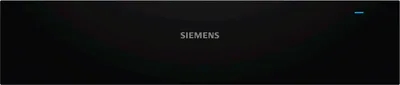 A black appliance with the Siemens logo in the center and a small blue light at the top right.