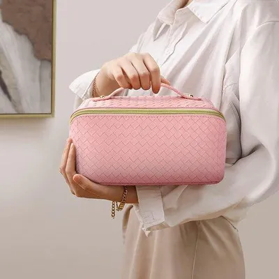 Immagine prodotto di Grande borsa da viaggio in Finto cuoioL impermeabile, con organizer per cosmetici da viaggio e design pieghevole.