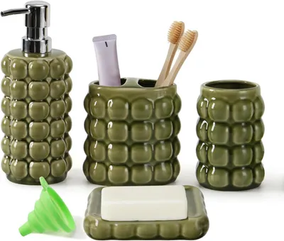 Image de Accessoires de salle de bain et céramique, ensemble de 4 pièces, comprenant un distributeur de savon, un porte-brosses à dents, un gobelet et un savonniер, idéal pour la salle de bain