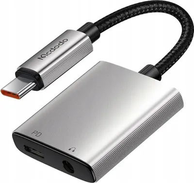 A close-up studio shot of a USB-C to 3.5mm audio adapter.