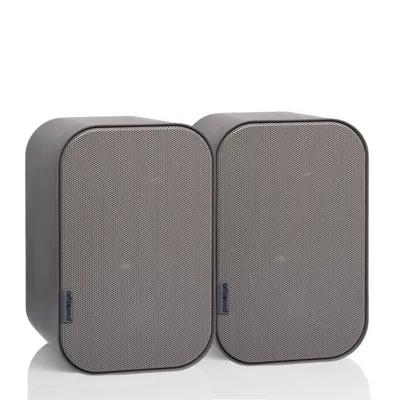 Two gray speakers are shown against a white background.