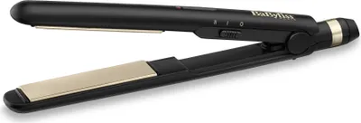 A black and gold hair straightener is shown against a white background.