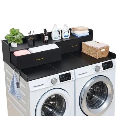 Image de Plan de travail SucceBuy pour machine à laver et sèche-linge (137 x 69,9 cm) avec étagère, 2 tiroirs et crochets, adapté pour une buanderie, une cave ou une cuisine, supportant jusqu'à 113 kg, de couleur noire, idéal pour le rangement des produits de lessive