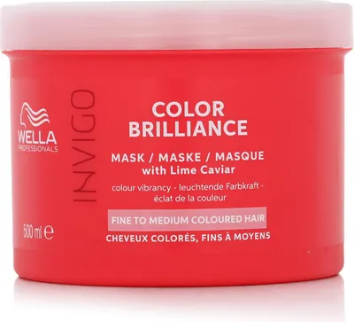 A product shot of a red hair mask container.