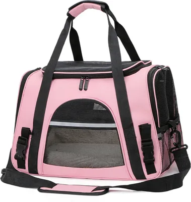 A pink and black pet carrier bag is shown against a white background.