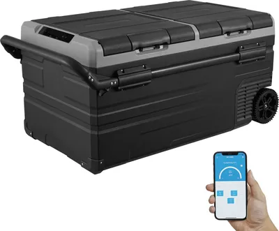 A black and gray portable cooler with wheels and a handle, shown with a smartphone displaying a temperature control app.