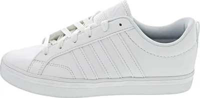 A side view of a white Adidas sneaker.