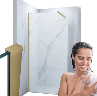A woman is showering in a modern bathroom with a walk-in shower.