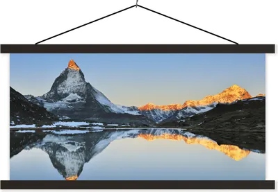 Produktbild von MuchoWow® Textilposter Matterhorn spiegelt sich im Riffelsee bei Sonnenaufgang in der Schweiz 120x60 cm mit schwarzem Rahmen - Dekoration Schlafzimmer