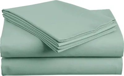 A stack of folded bed sheets.