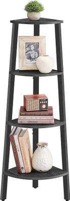 A black, four-tiered corner shelf unit with decorative items on each shelf.