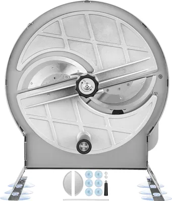 A close-up, front-facing view of a manual slicer machine with its accessories.