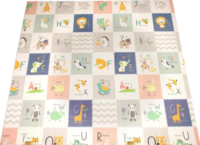 A colorful play mat with animal and alphabet designs.