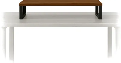 A monitor stand with a wooden top and black metal legs is placed on a table.
