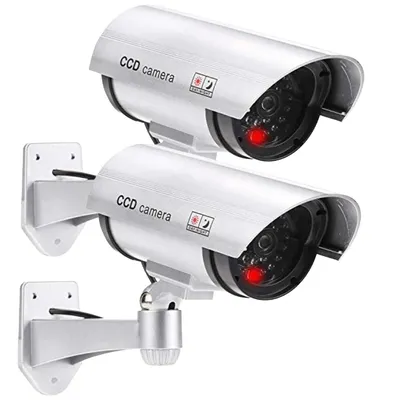 Produktbild von Kamera Attrappe im 2er Set, Dummy Kamera mit rot blinkender LED und Objektiv, schwenkbar, täuschend echt für Wand- Deckenmontage. Silberfarben. 2 Stück im Set