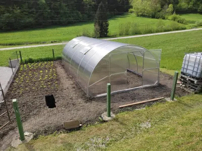 Produktbild von Polycarbonat Gewächshaus "Palace" 4x8m aus Stahl, mit 6mm Polycarbonat. Mit Großen Doppeltüren auf jeder Seite