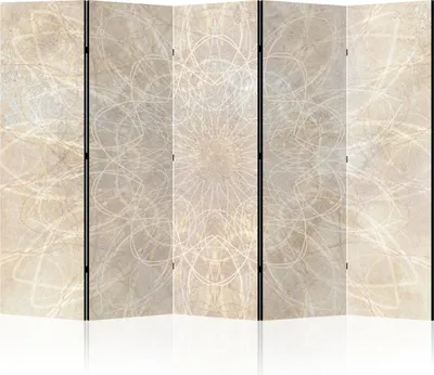 A multi-panel room divider with a decorative pattern.