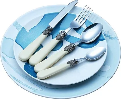 Image de Élégant service de couverts aux manches crème d'époque
