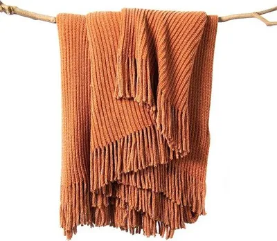 Immagine prodotto di Coperta decorativa in velluto Unyqoos® color terracotta – plaid morbido e versatile per divano e letto, con frange in stile bohémien