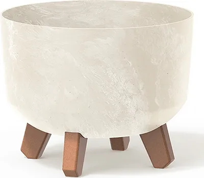 A cream-colored planter with a marbled pattern sits on three brown legs against a white background.