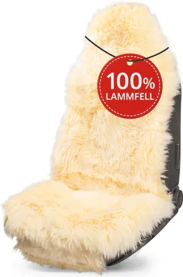 A fluffy, cream-colored sheepskin car seat cover is displayed on a car seat against a white background.