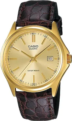 A close-up studio shot of a gold-faced Casio watch with a brown leather strap.