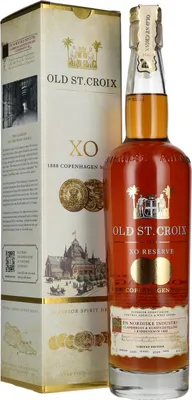 A bottle of rum and its packaging are displayed.