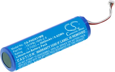 A blue cylindrical battery pack with white text and a white connector with red and white wires.