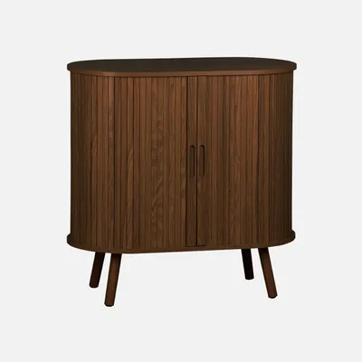 A wooden sideboard with two doors and four legs, shown against a white background.