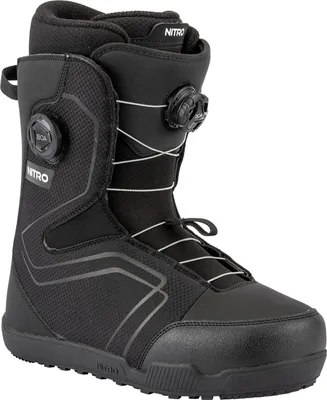 A black snowboard boot shown from the side against a white background.