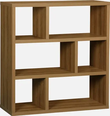 A wooden bookshelf with multiple compartments against a white background.