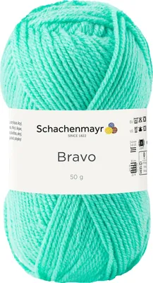 A ball of green yarn with a label.