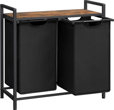 A laundry basket with two compartments and a shelf on top.