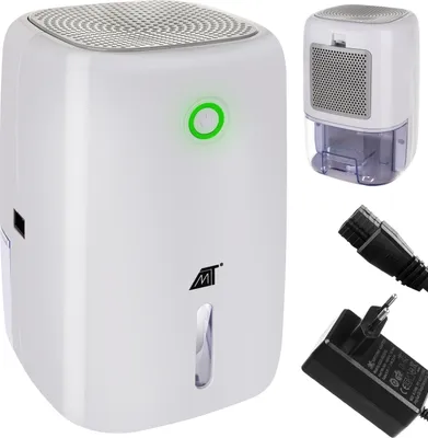 A white electric dehumidifier with a green power button and a water level indicator, shown with its power adapter and cable.