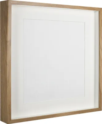 A square wooden picture frame with a white matting, shown at an angle against a white background.